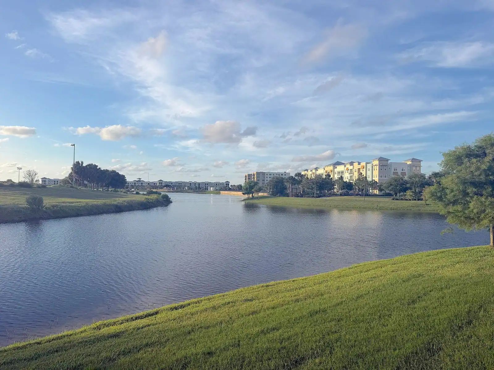 Lake and mown banks at the Viera town center, Florida